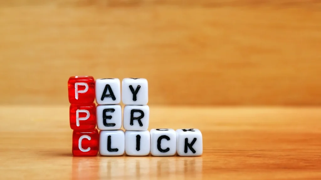 A visual representation of Pay-per-click (PPC) advertising UK with the words 'Pay Per Click' built using letter blocks